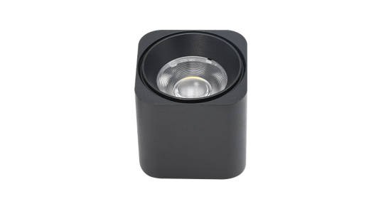 Black square surface-mounted downlight with a COB source behind a reflector
